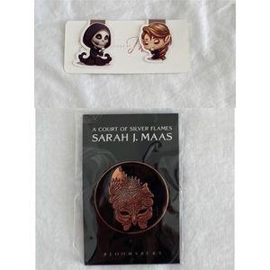 two magnetic bookrmarks one enamel pin